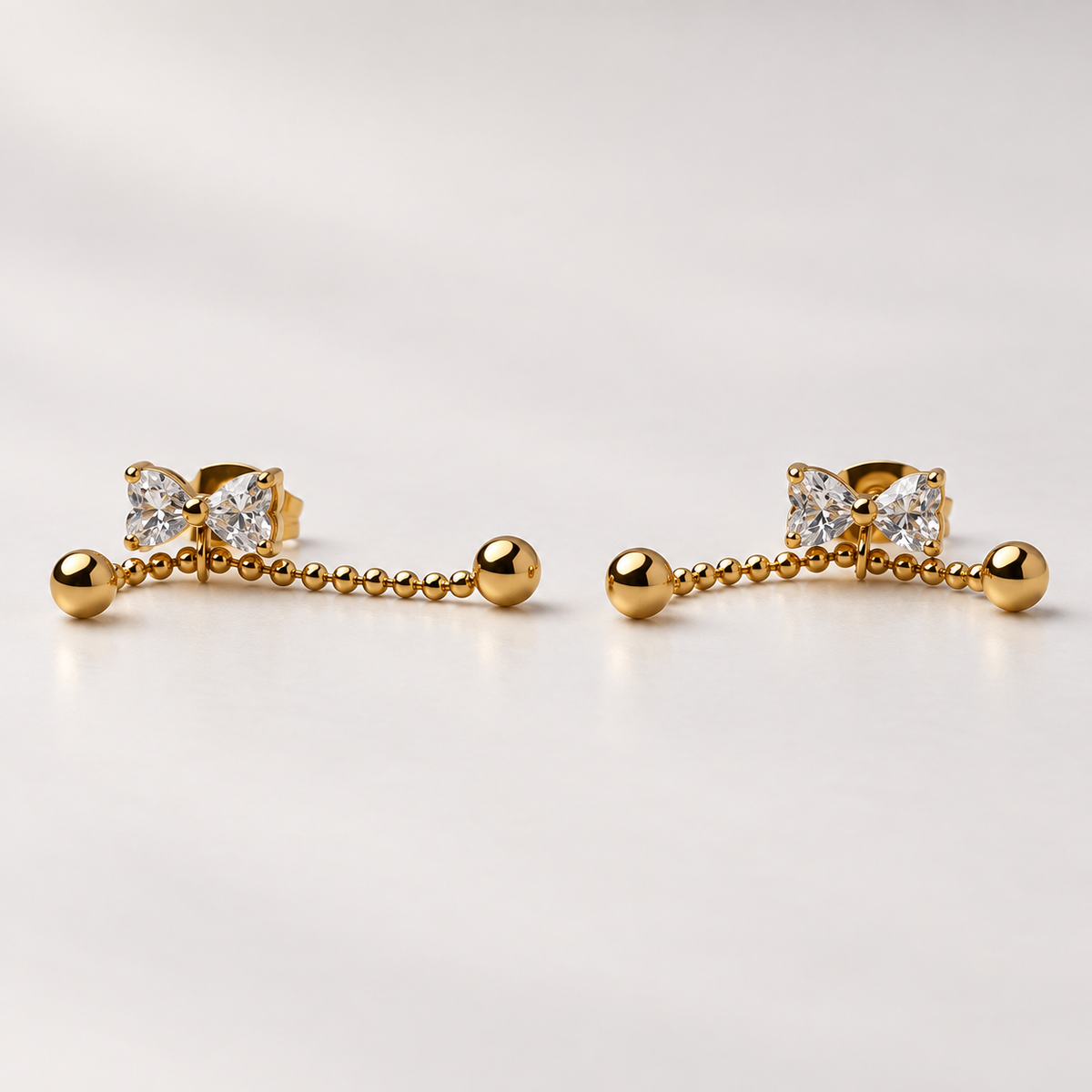 The Celeste Bow & Pearl Drop Studs