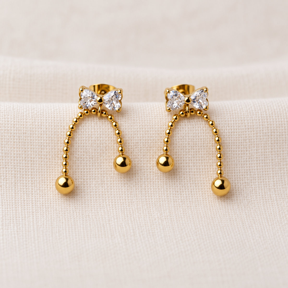 The Celeste Bow & Pearl Drop Studs